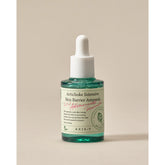 Bottle of Artichoke Intensive Skin Barrier Ampoule with AXIS-Y branding on a beige background