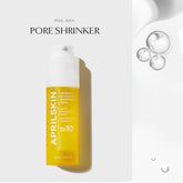 Aprilskin Pore Shrinker bottle with droplets on a white background