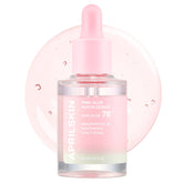 Pink skincare serum bottle with dropper on a white background
