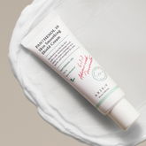 Tube of PANTHENOL 10 Skin Smoothing Shield Cream on a white background