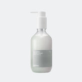 Skincare bottle with pump on a light gray background