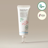 Tube of AXIS-Y Heartleaf My Type Calming Cream on a beige background with vegan and animal test-free logos.