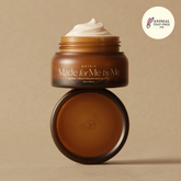 Brown jar of cream with a dollop on top against a beige background, featuring 'AXIS-Y' branding.