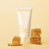 Tube of 'I'm From' Honey Syrup Pack Cleanser with honeycomb packaging on a beige background