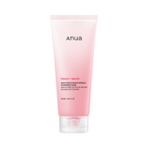 Pink tube of anua cleanser on a white background