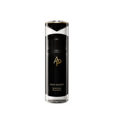 Black skincare serum bottle with gold logo on a white background