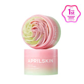 Aprilskin pink and green cleanser with packaging on a white background
