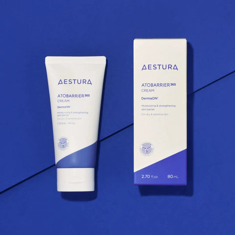 Aestura Atobarrier 365 cream tube and packaging on a blue background