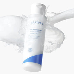 White bottle with blue accents labeled 'Adestura' on a white background