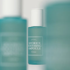 Blue bottle of 'Licorice Soothing Ampoule' with a white label on a blurred background