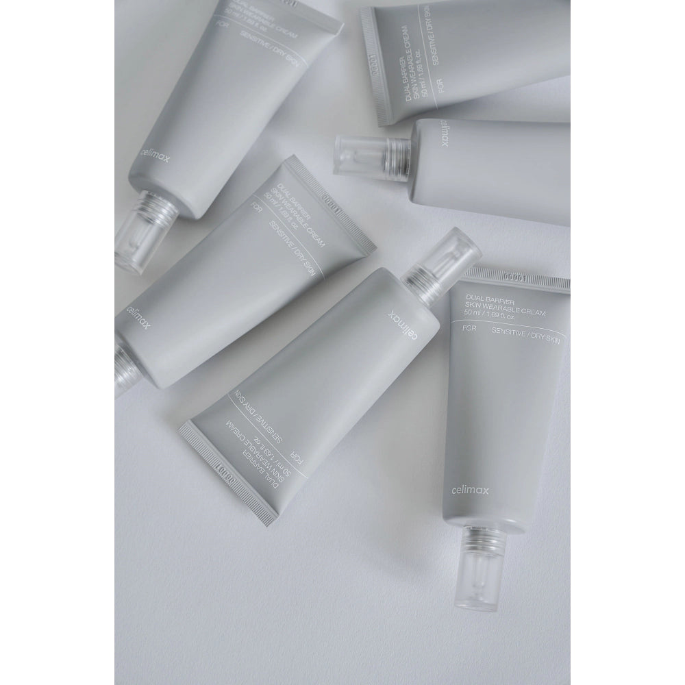 Collection of skincare products on a light gray background