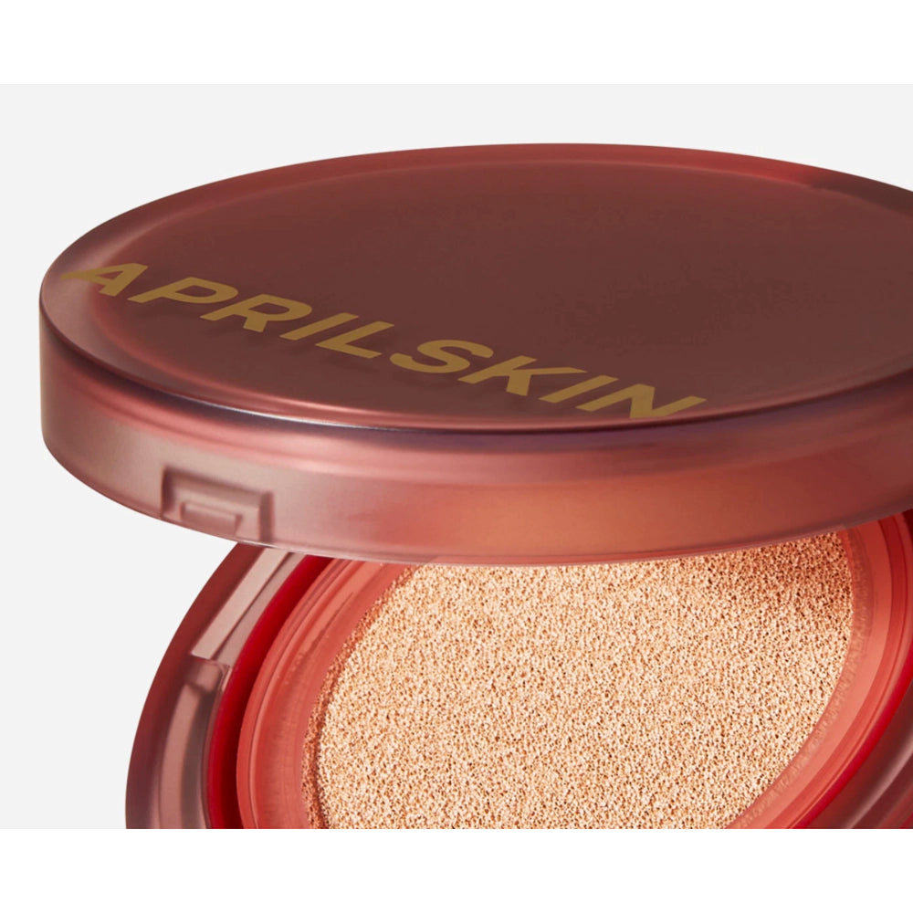 Open AprilSkin compact with visible powder on a white background
