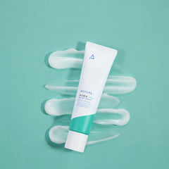 Tube of cream on a light green background