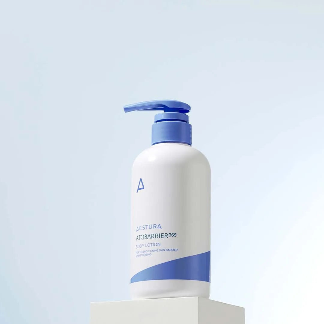 White bottle with blue pump on a light blue background