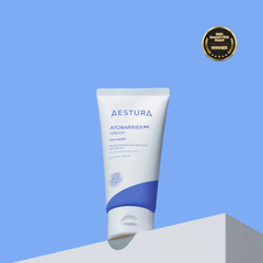 Aestura Atobarrier cream tube on a blue background with a gold award badge.