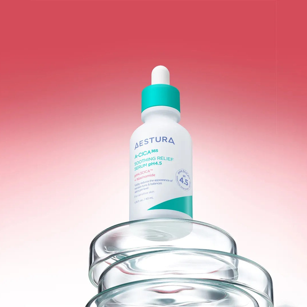 Skincare dropper bottle with a gradient red to pink background