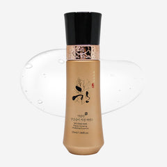 Cosmetic bottle with black cap and beige body on a white background