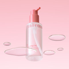 Skincare bottle with pink pump on a pink background