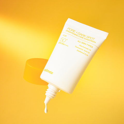 Sunscreen bottle with dropper on a yellow background