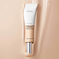 Anua foundation tube on a beige background