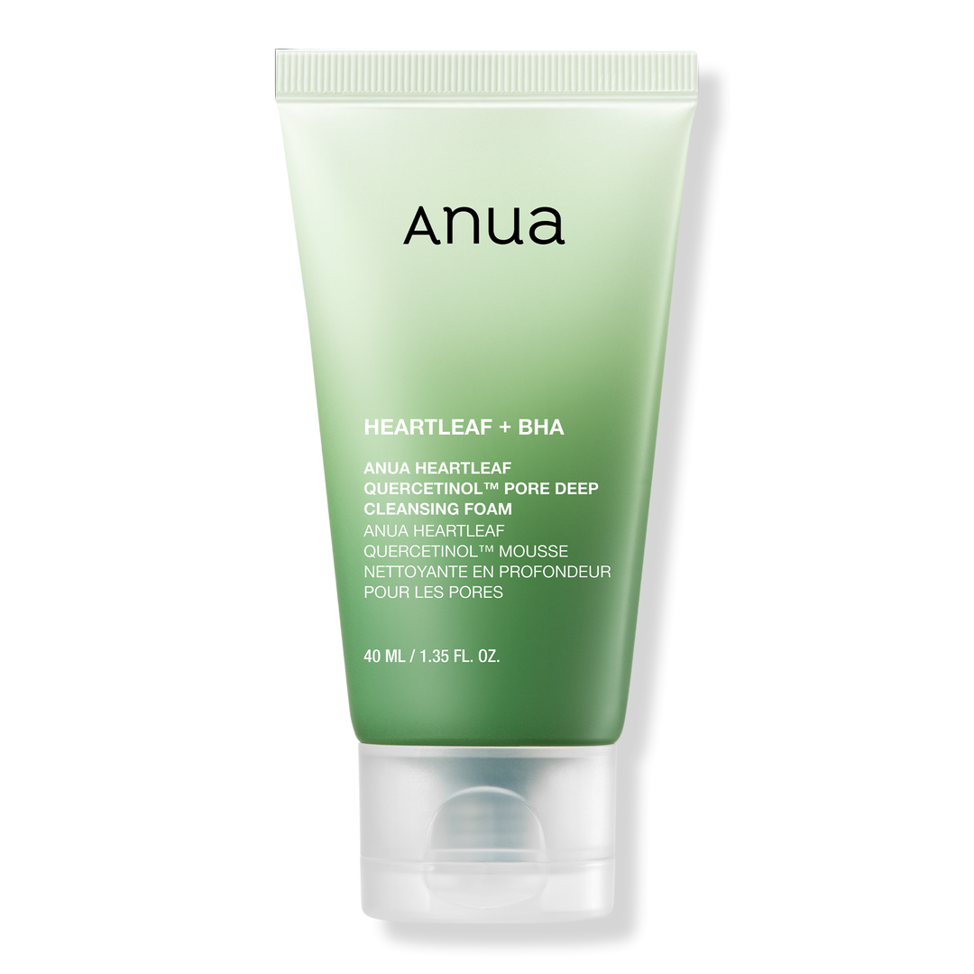 Green tube of Anua skincare product on a white background