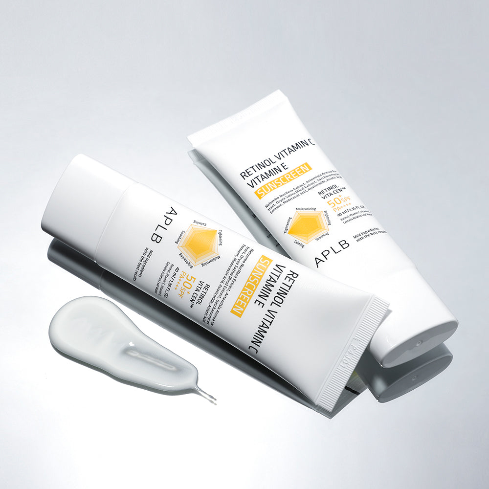 Two APLB skincare products with a gray background