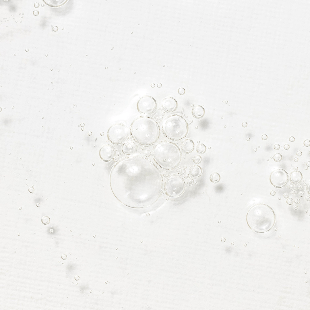Transparent bubbles on a light gray background