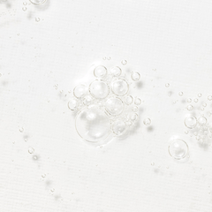 Transparent bubbles on a light gray background