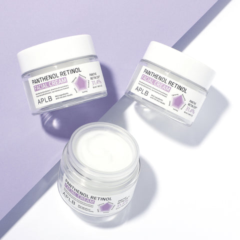 Three jars of APLB Panthenol Retinol cream on a light purple background