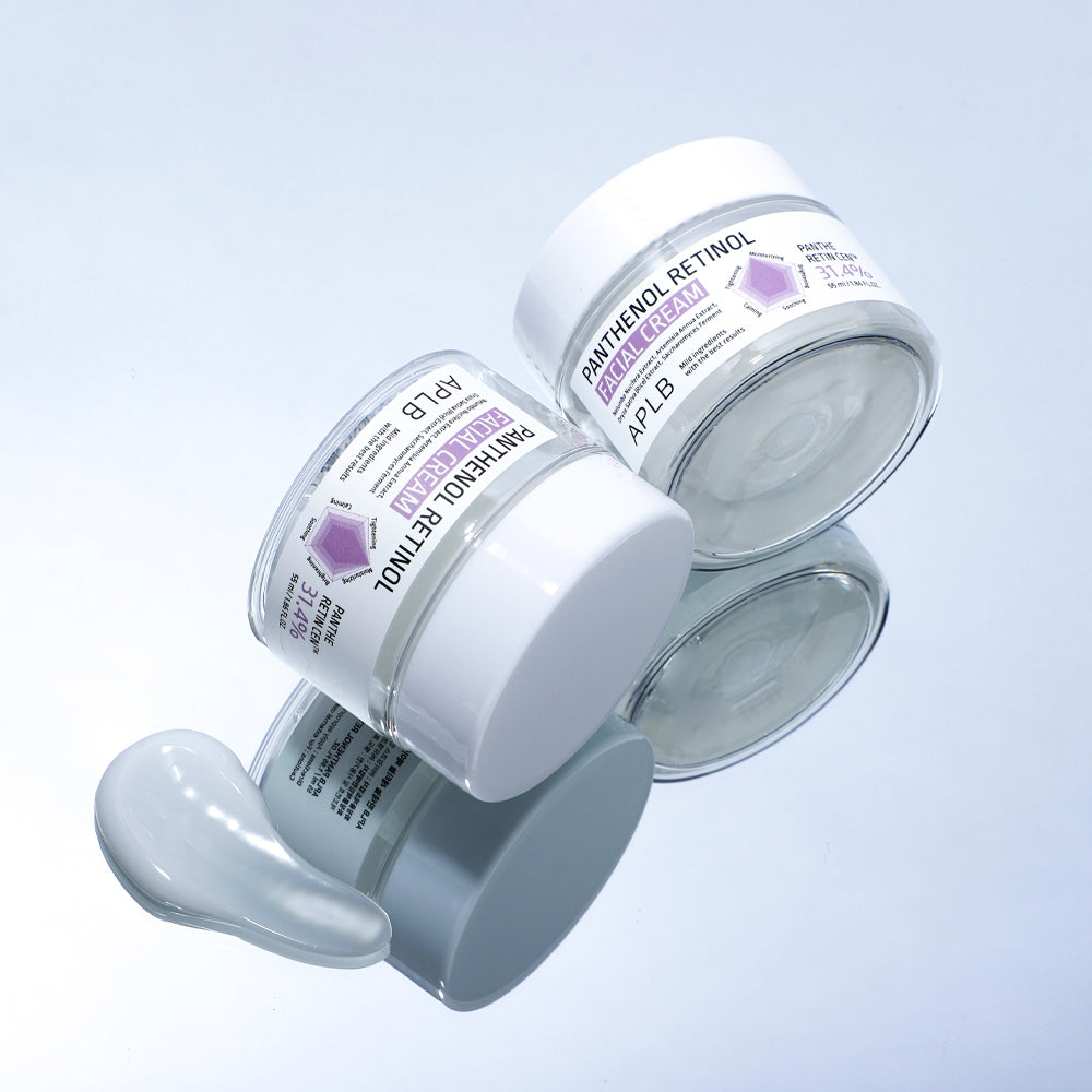 Two jars of Panthenol Retinol cream on a light blue background