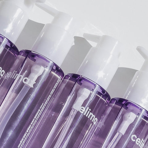 Multiple bottles of a skincare product with 'celima' branding on a light gray background.