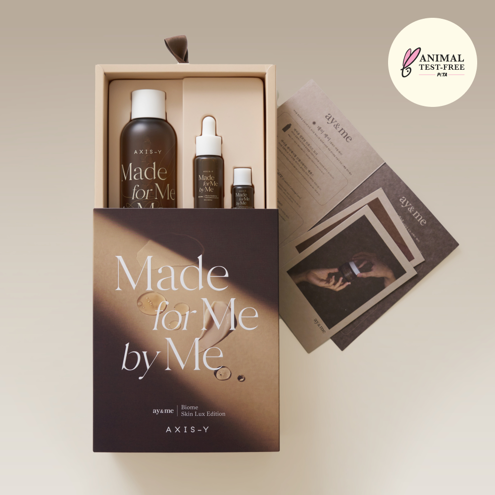  AXIS-Y skincare product set with 'Made for Me by Me' packaging on a beige background