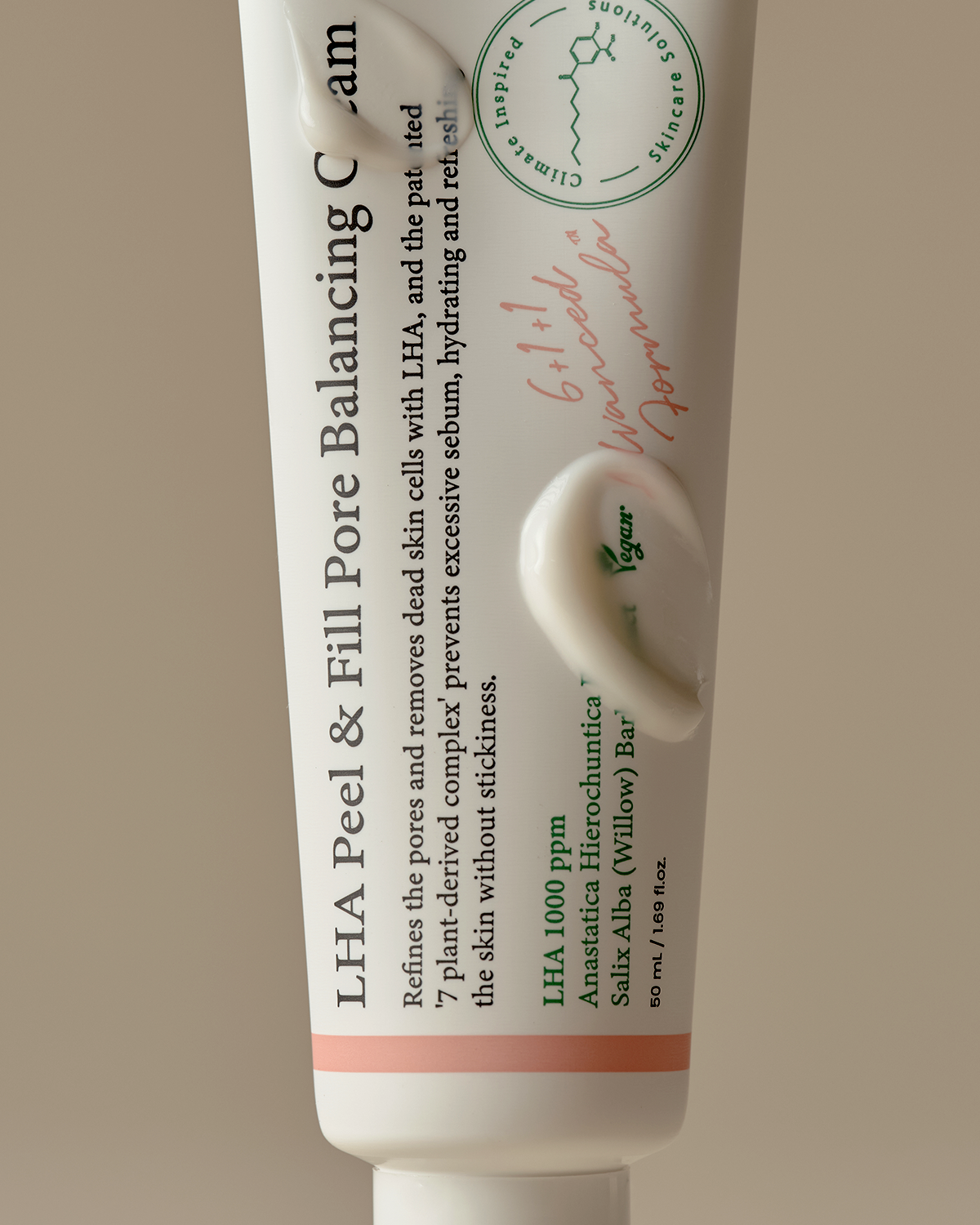 Tube of LHA Peel & Fill Pore Balancing Cream with branding on a beige background