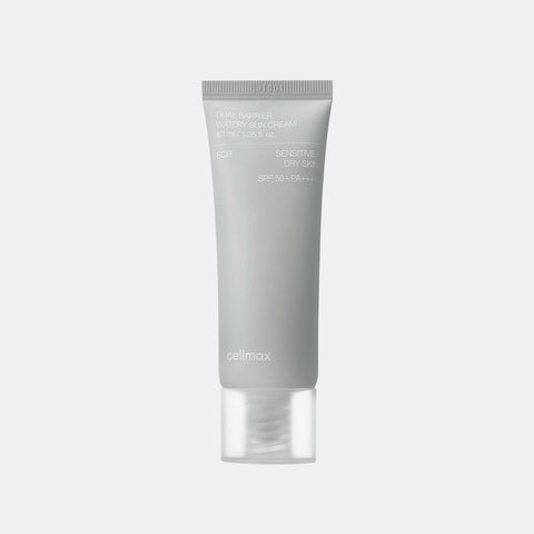 Gray tube of cream with 'cellmax' branding on a light gray background