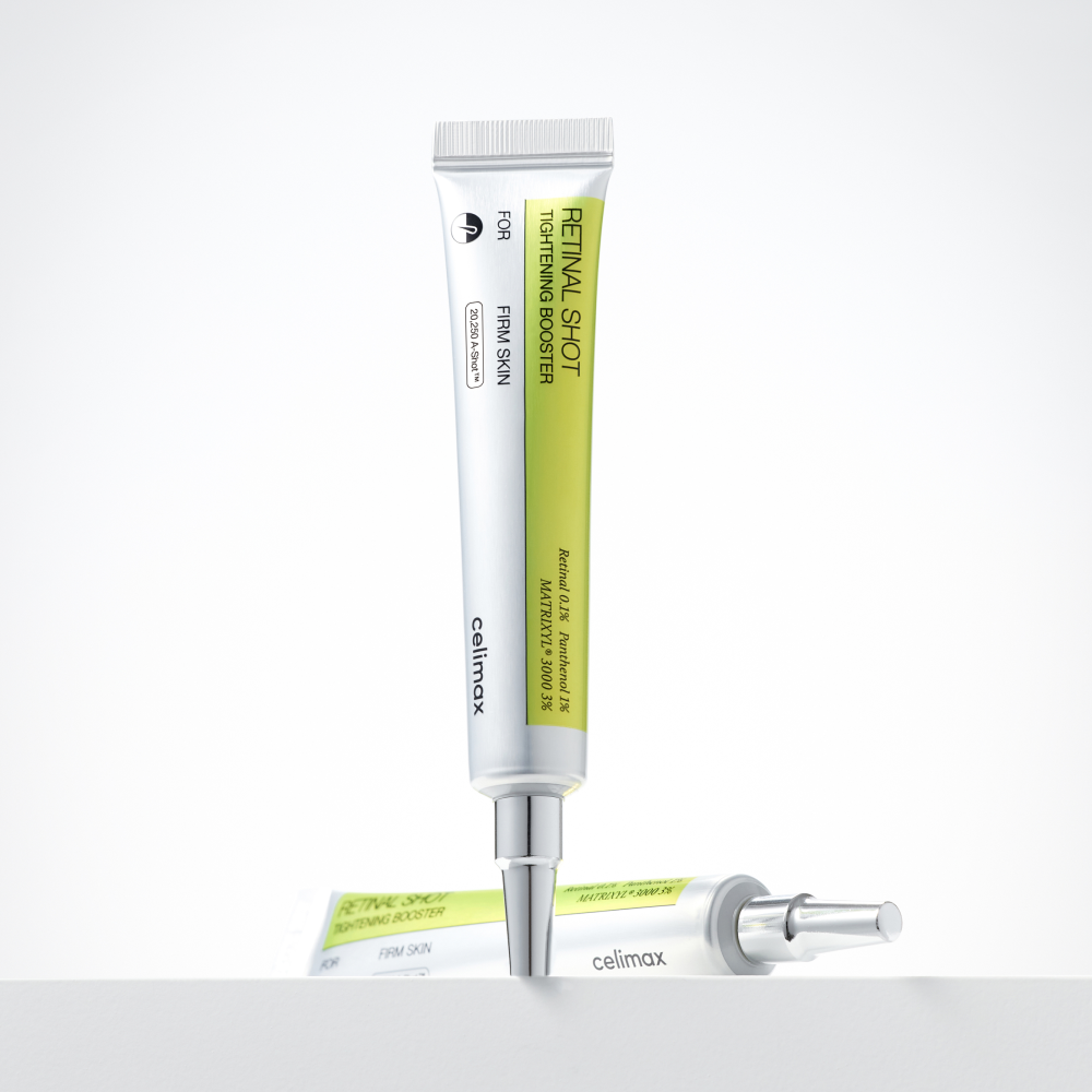 Skincare product with applicator on a white background