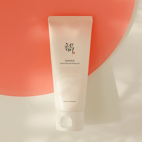 Tube of Beauty of Joseon Agitent Blemish Peeling Gel on a white surface with a red background