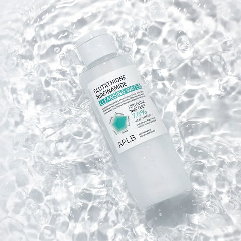 Bottle of skincare product with 'APLB' branding on a water background