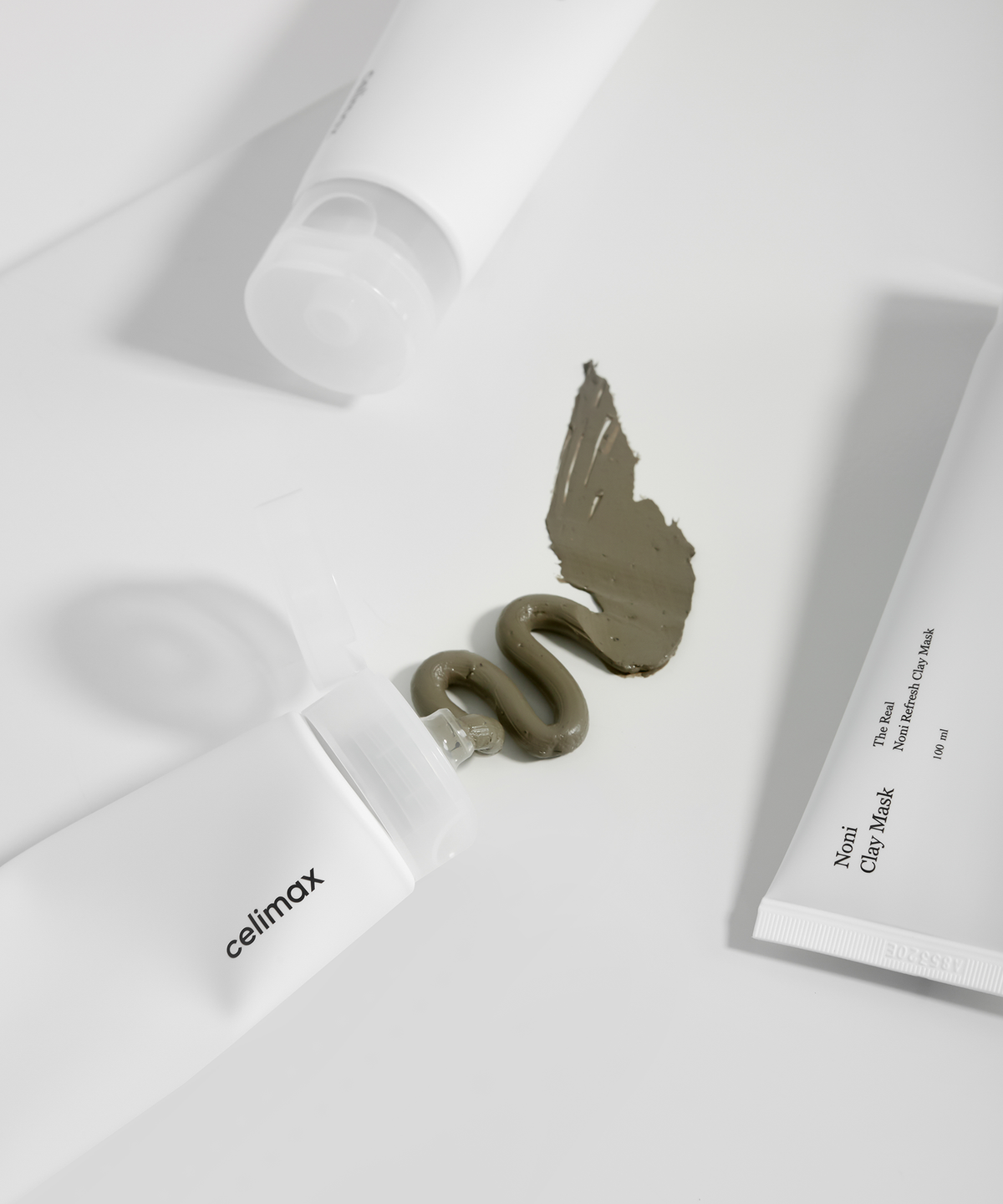Cosmetic mask with a swatch on a white background, featuring the brand 'celimax'.