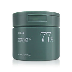 Green jar of Anua Heartleaf 77 Clear Pad on a white background