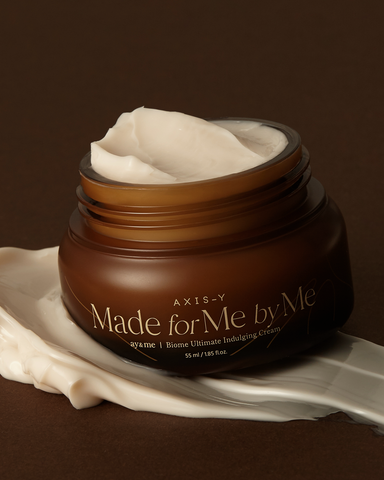 Brown jar of cream with 'Made for Me by Me' text on a brown background