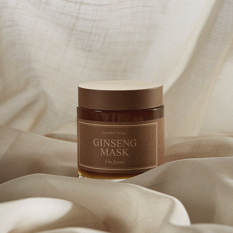 Jar of Ginseng Mask on a beige fabric background