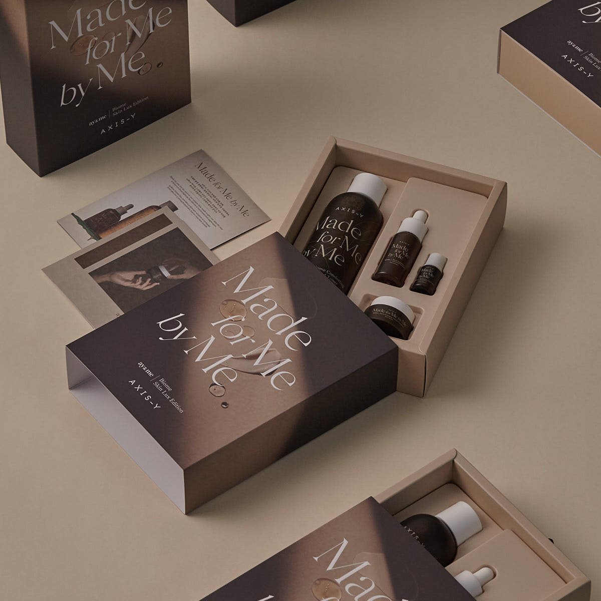 Makeup kit with 'Made for Me by Me' packaging on a beige surface