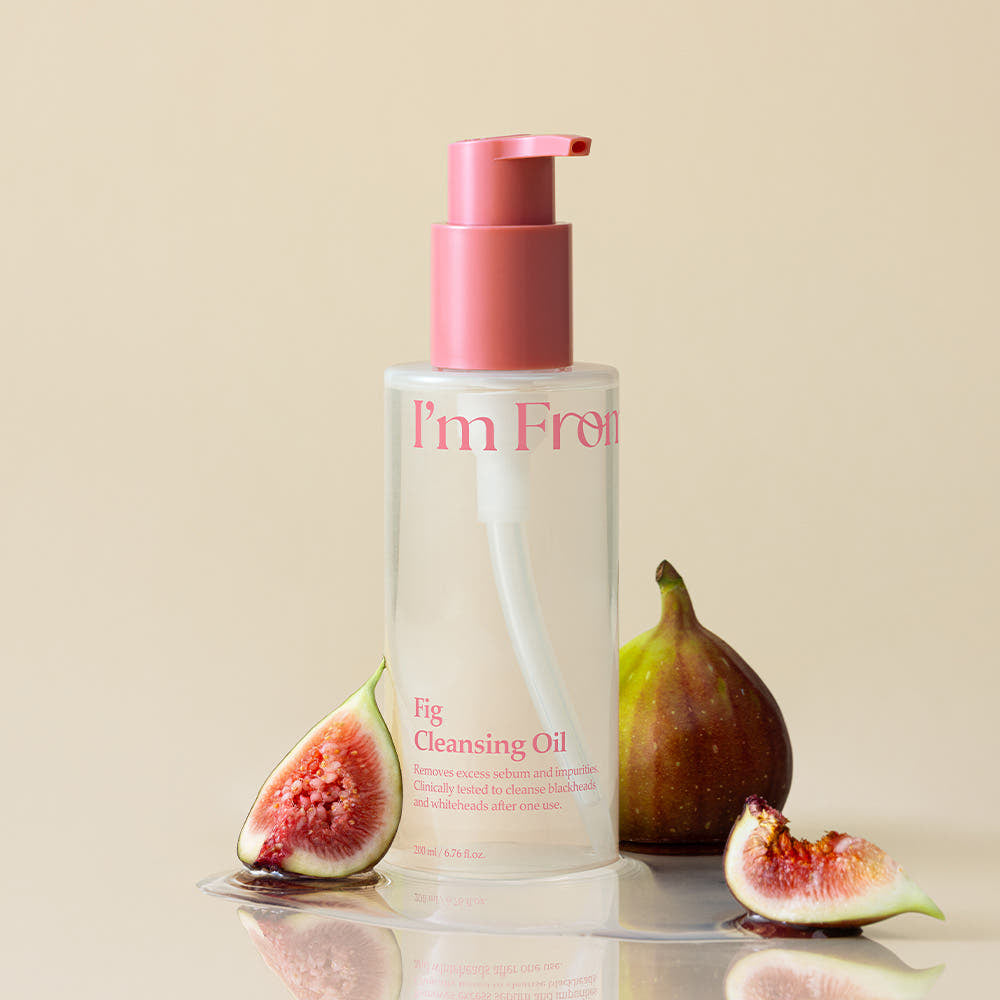I'm From Fig Cleansing Oil bottle with figs on a beige background