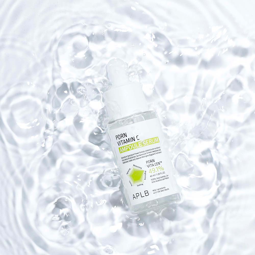 APLB vitamin C ampoule serum bottle on water surface