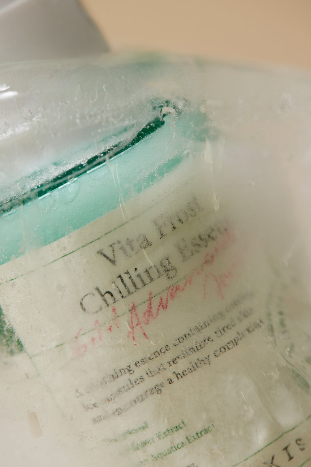 Close-up of a bottle label with text on a white background