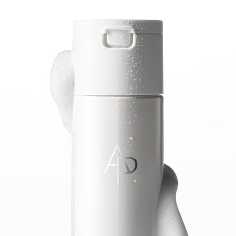 White handheld device with a brand logo on a white background