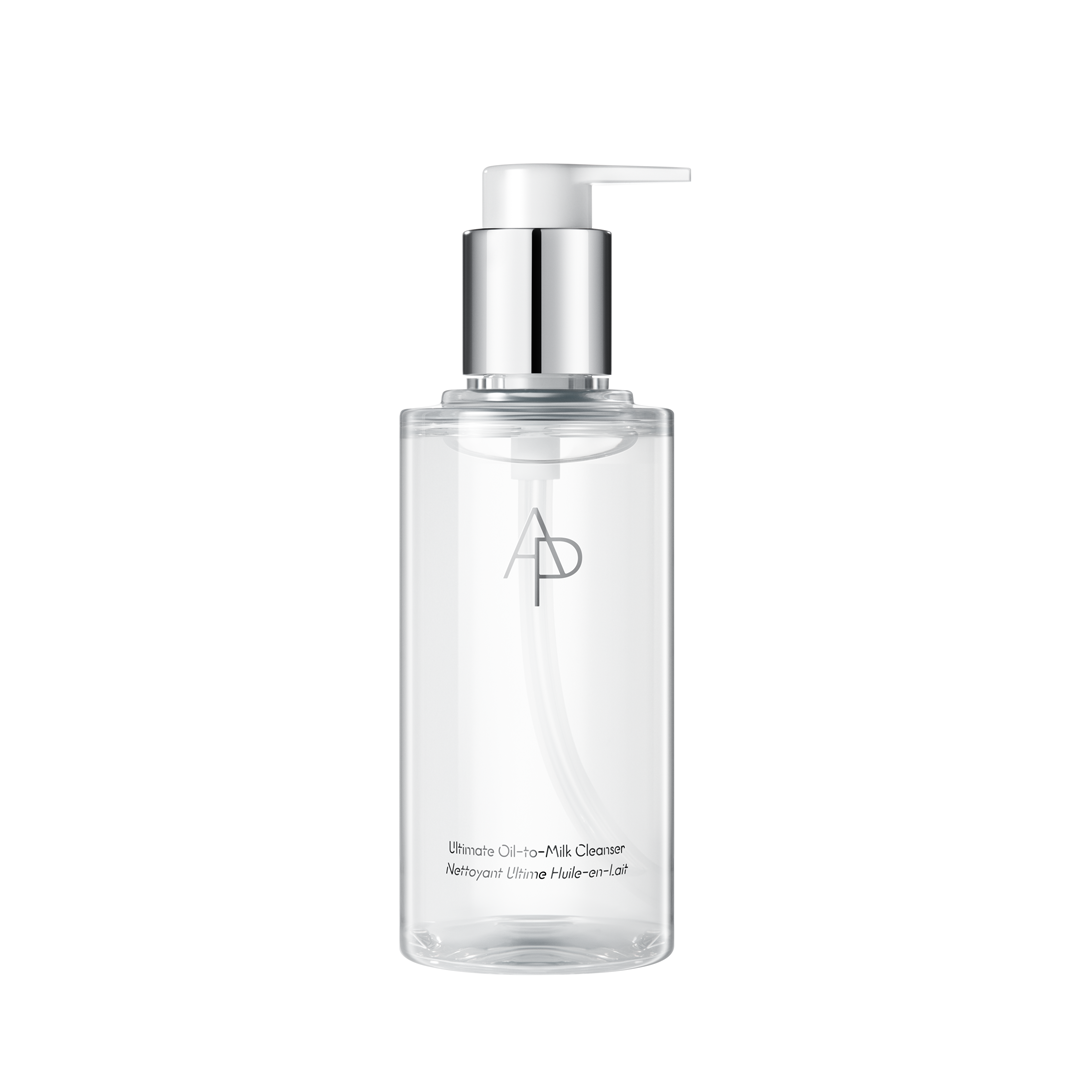 Clear skincare bottle with silver pump on a white background