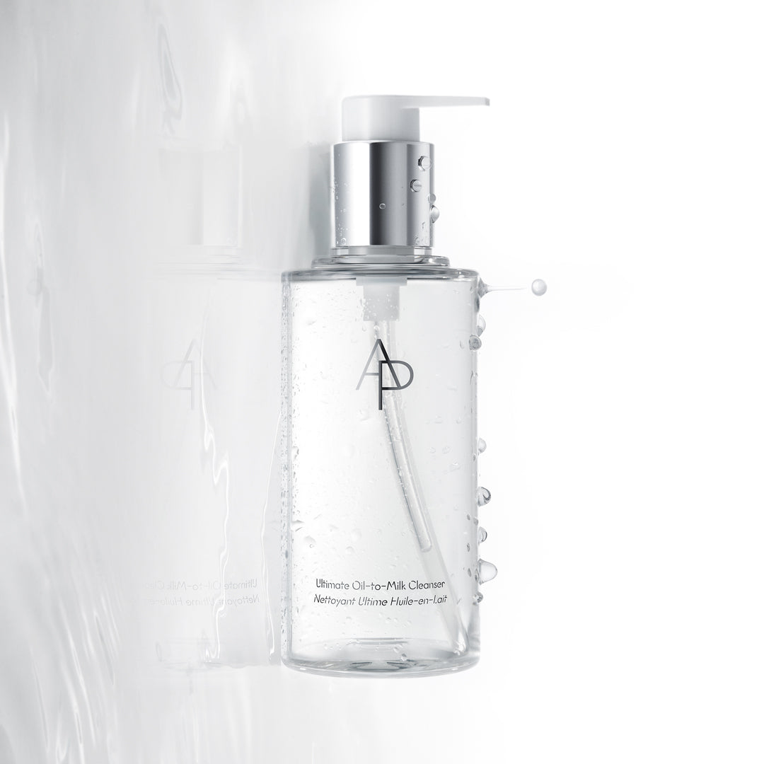 Clear skincare bottle with pump on a white background