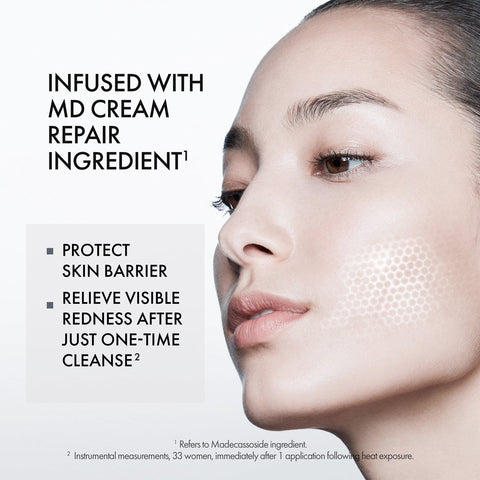 Advertisement for skincare product with a close-up of a person's face and text about MD Cream Repair Ingredient.