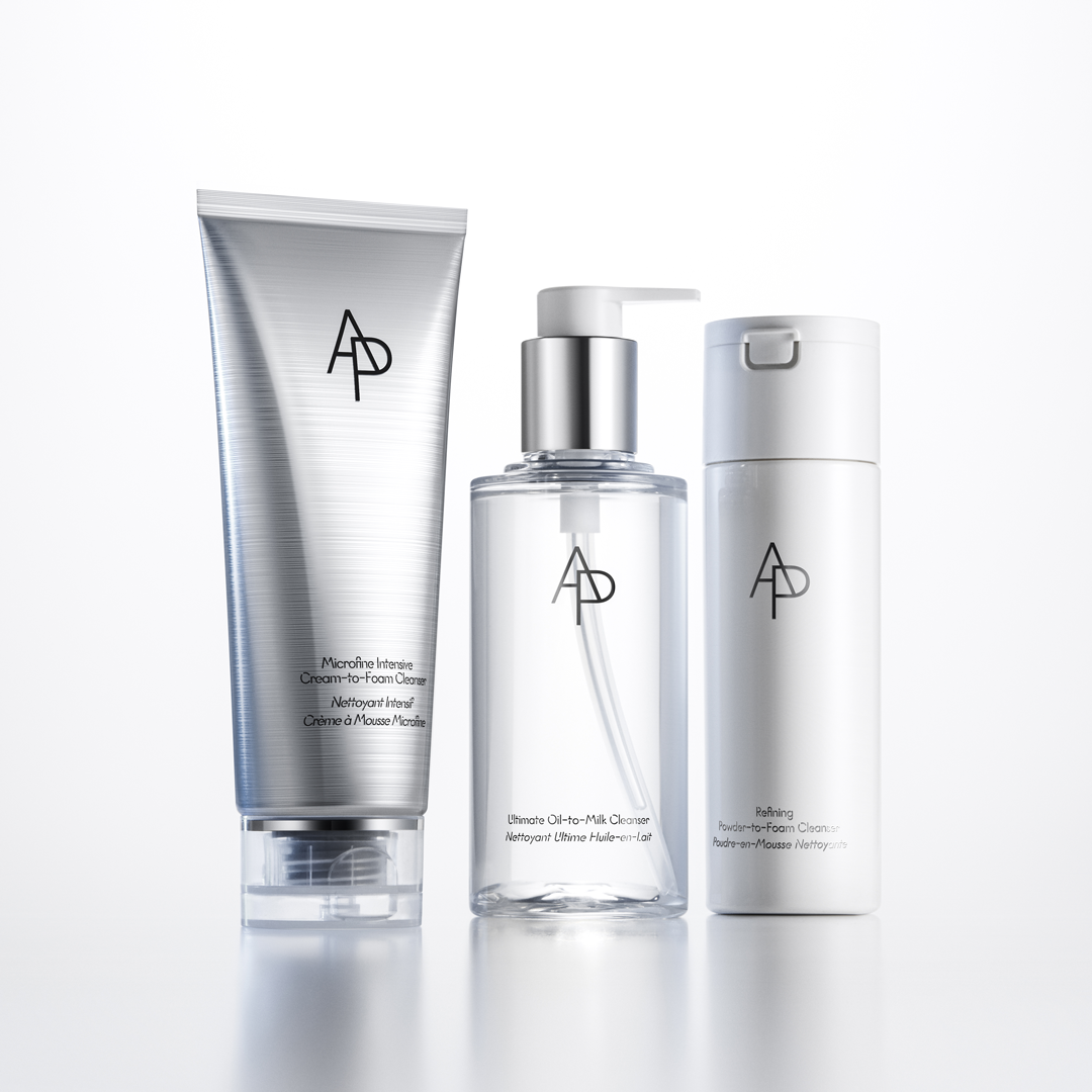 Three skincare products with a brand logo on a white background